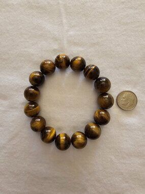 Natural Tiger eye Crystal Bracelet.  Stretchable cord.